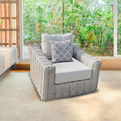 Chaise de patio avec coussins Dejonae