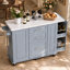 Îlot de cuisine Kavrell 50,7 po avec abattant, chariot de cuisine roulant avec armoire à poubelle inclinable, organisateur coulissant à 2 niveaux, 2 tiroirs, armoire de rangement et roues verrouillables-703975076