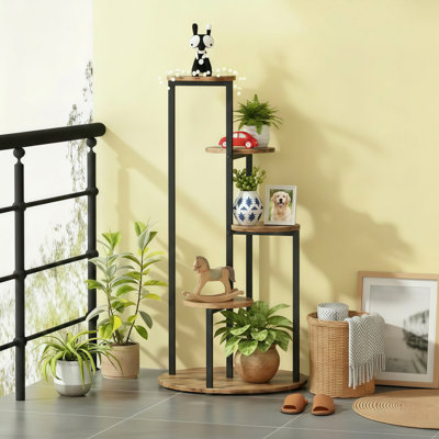 Industrial-chic 4-tier Rotating Corner Plant Stand by Trent Austin Design