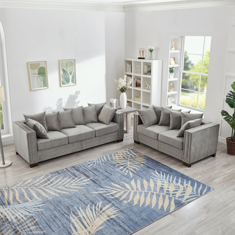 Canapé 2 + 3 places en velours avec accoudoirs carrés et décoration cloutée, Gris