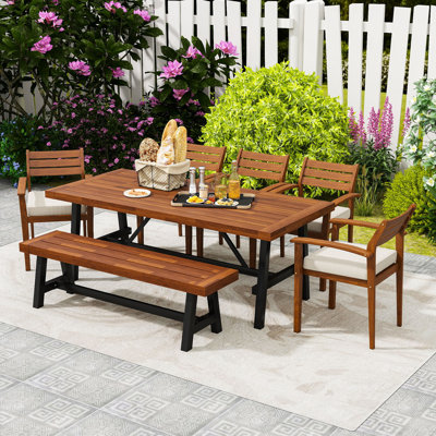7-Piece Patio Dining Table Set with Removable Cushions, Ergonomic Chairs, Bench and Adjustable Feet