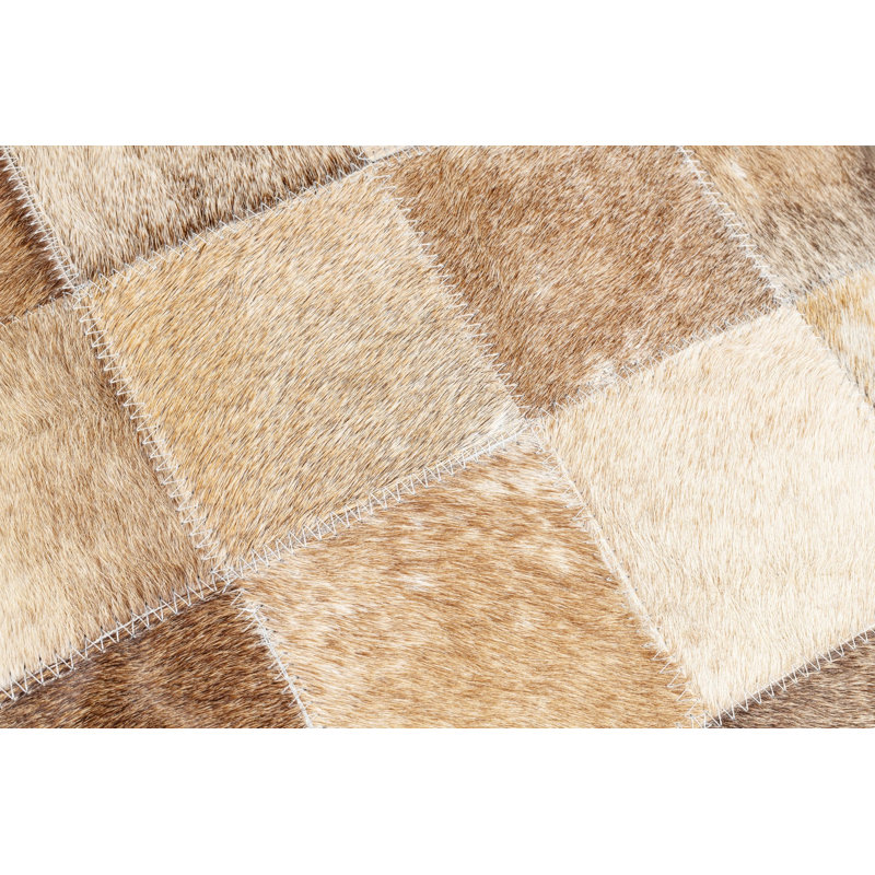 Coussin en peau de vache