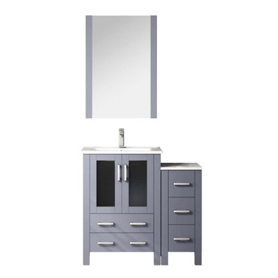 Meuble-lavabo gris foncé de 36 po de largeur avec armoire latérale à double porte, robinet inclus, surface en céramique blanche et miroir suspendu pleine longueur de 22 po intégré au comptoir de salle de bain.