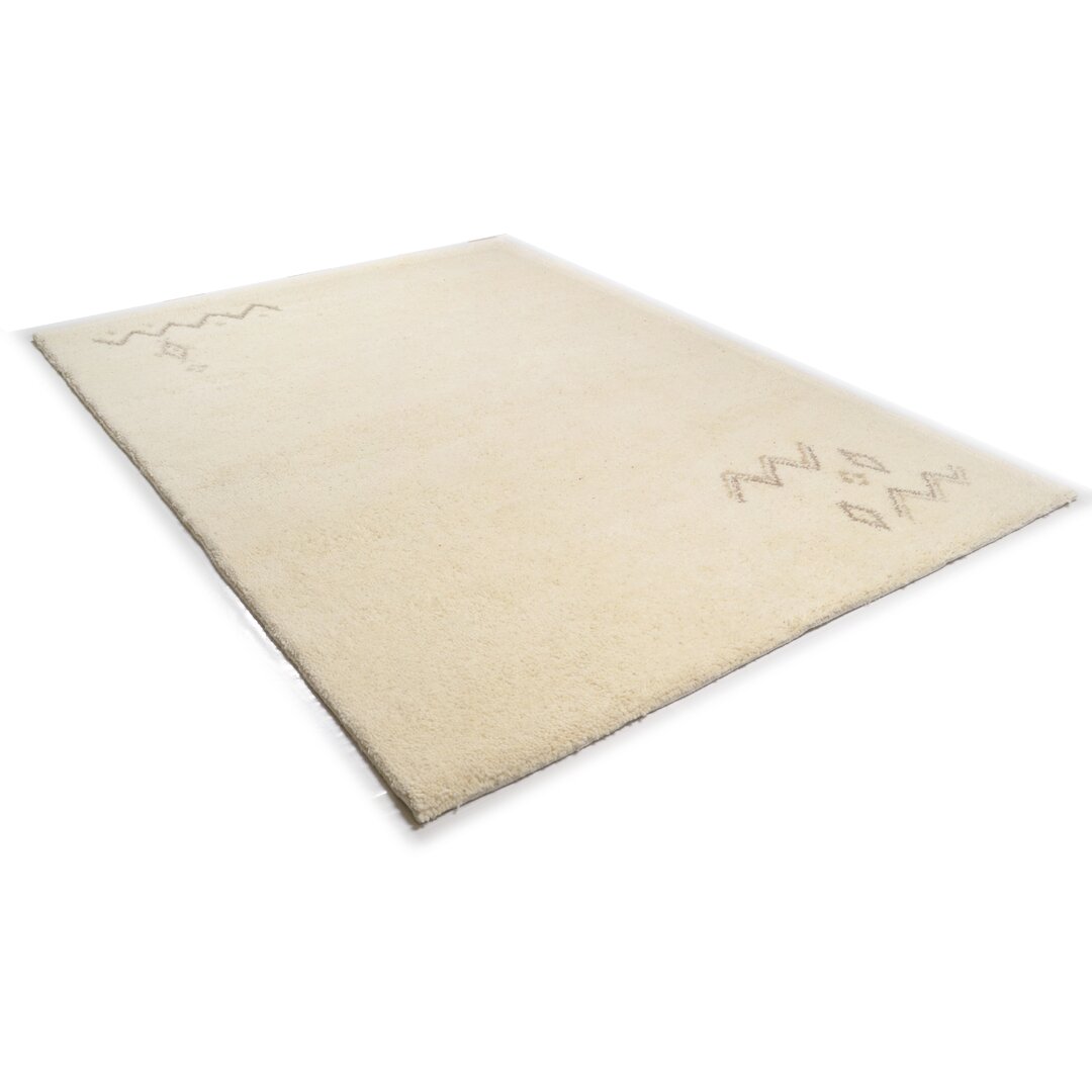 Handgefertigter Teppich Arik aus Wolle in Beige