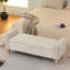 Banc de rangement rembourré avec accoudoirs roulés