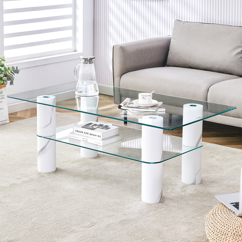 Modern minimalist double layered transparent tempered glass coffee table and coffee table, paired with white MDF decorative columns. Computer desk. Game table.