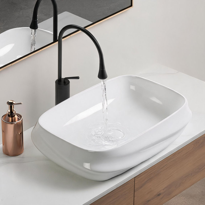 Vasque rectangulaire en céramique blanc laiteux de 61 cm (24 pouces) avec décor en bas-relief texturé et bonde préinstallée.