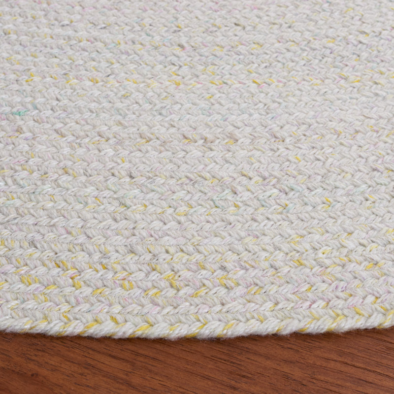 Ivory and Yellow Round Braided Reversible Wool Area Rug