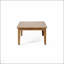 Table basse d'extérieur en bois d'acacia durable avec un design rustique et une finition résistante aux intempéries, parfaite pour le patio et le jardin
