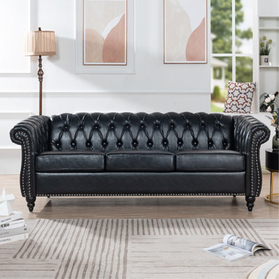 84.65" Black PU Rolled Arm Chesterfield Three Seater Sofa.