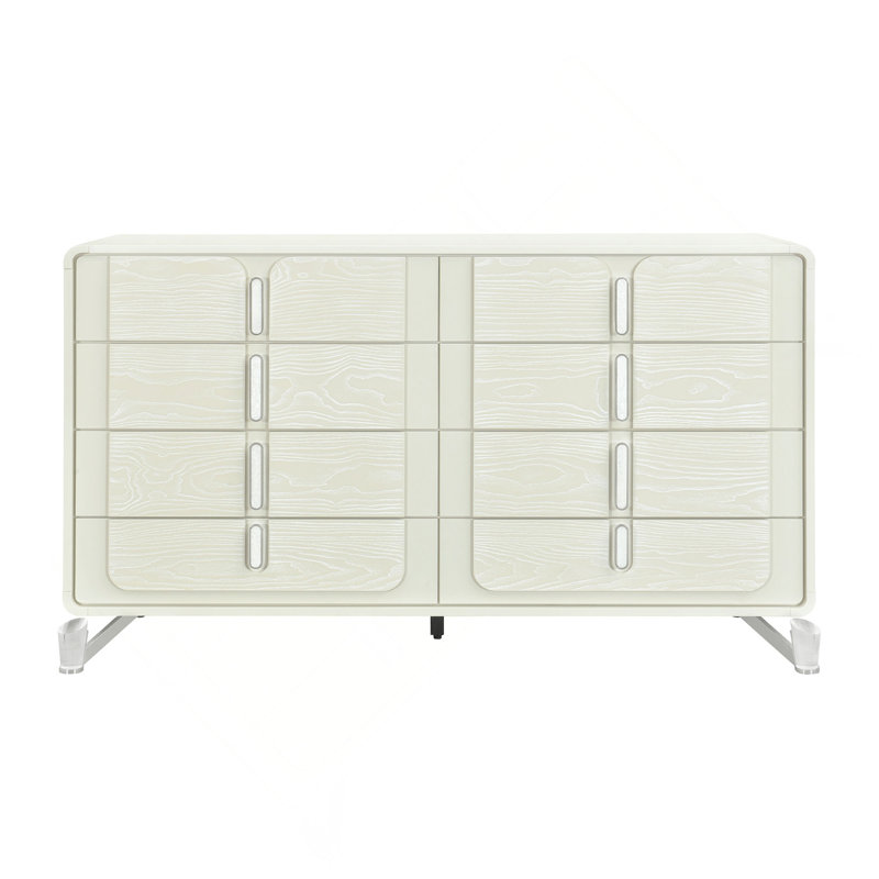 La commode et la commode avec une finition en bois clair et des poignées encastrées combinent un style minimaliste avec un rangement de chambre peu encombrant