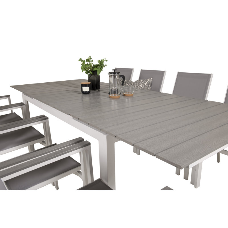 Faiyaz 8 - Person Patio Dining Set Extendable Rectangular Table