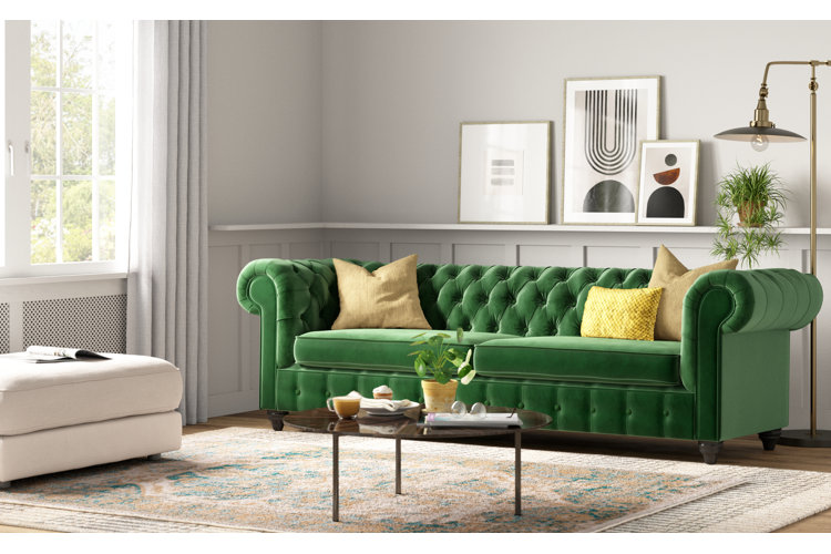 minimalist living room with green sofa