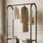 Black Clothing Rack for Hanging Clothes,Sturdy metal clothes rack,Modern Garment Rack with Bottom Storage Shelves and 6 Side Hooks,Freestanding Wardrobe Rack for Bedroom or Closet 