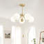 Lustre 5 têtes à finition dorée
