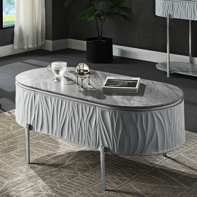 Table basse grise à finition lustrée et chrome