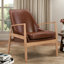 Fauteuil en cuir de style Mid-Century avec structure en bois et dossier haut