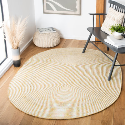 Tapis en laine / coton tissé à la main Mcclelland en ivoire / or