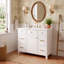 Meuble-lavabo blanc de 91 cm (36 po) avec lavabo en céramique, structure en bois massif, portes à fermeture amortie, étagères réglables et 3 tiroirs, dont un tiroir de rangement double profondeur pour sèche-cheveux.-1113337677