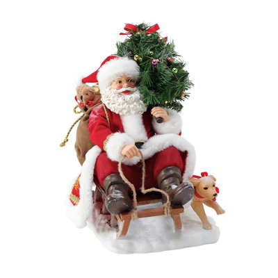 Figurine Père Noël et chien de compagnie possible