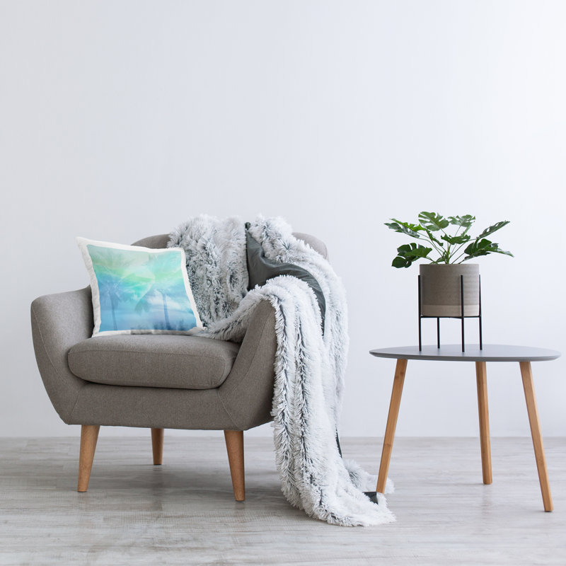 Coussin d'été imprimé soleil bleu par Mia Jensen