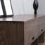 Cabinet audiovisuel noir avec tiroir en noyer