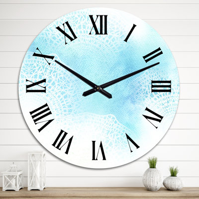Dentelle blanche sur fond bleu clair - horloge murale moderne