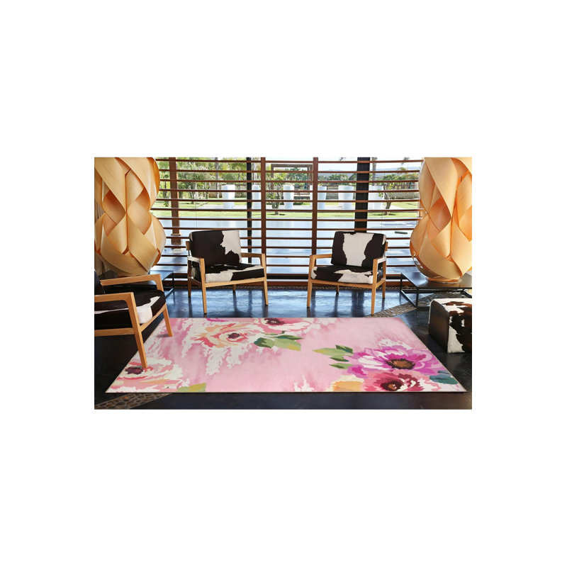 Tapis floral lavable à base tissée rose