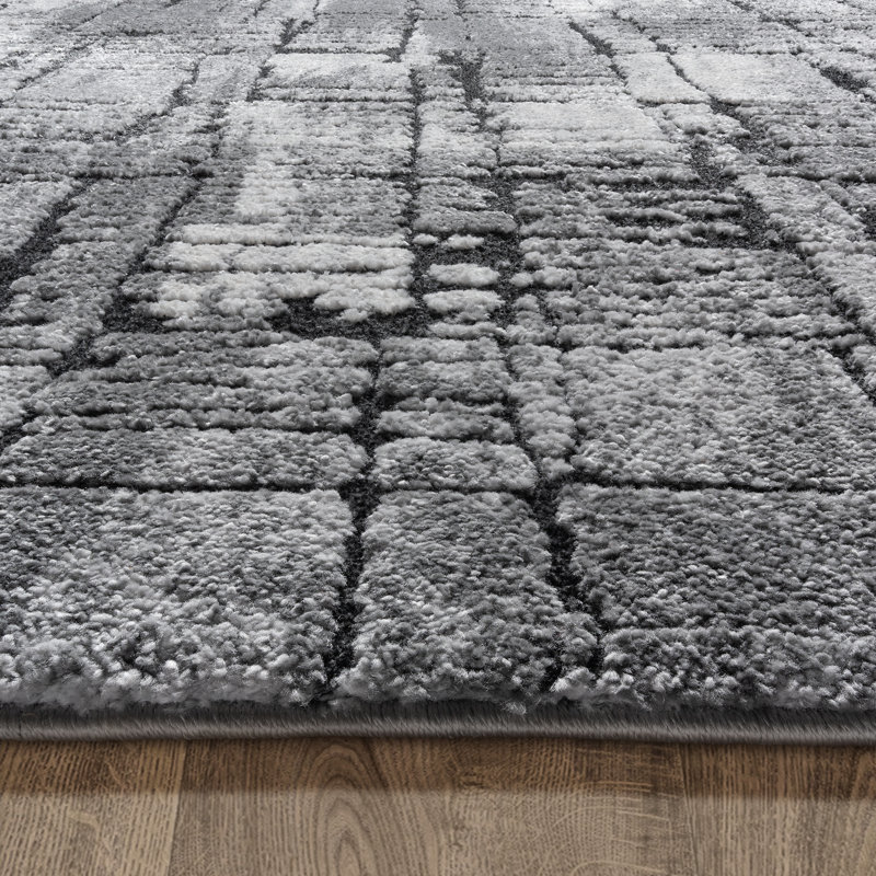 Imani 6' x 9' Black and Gray Abstract Shag Rug