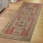 Tapis chic non tissé à motif doux avec un motif floral complexe dans des tons chauds de terre pour une touche raffinée dans n'importe quel décor-114328985