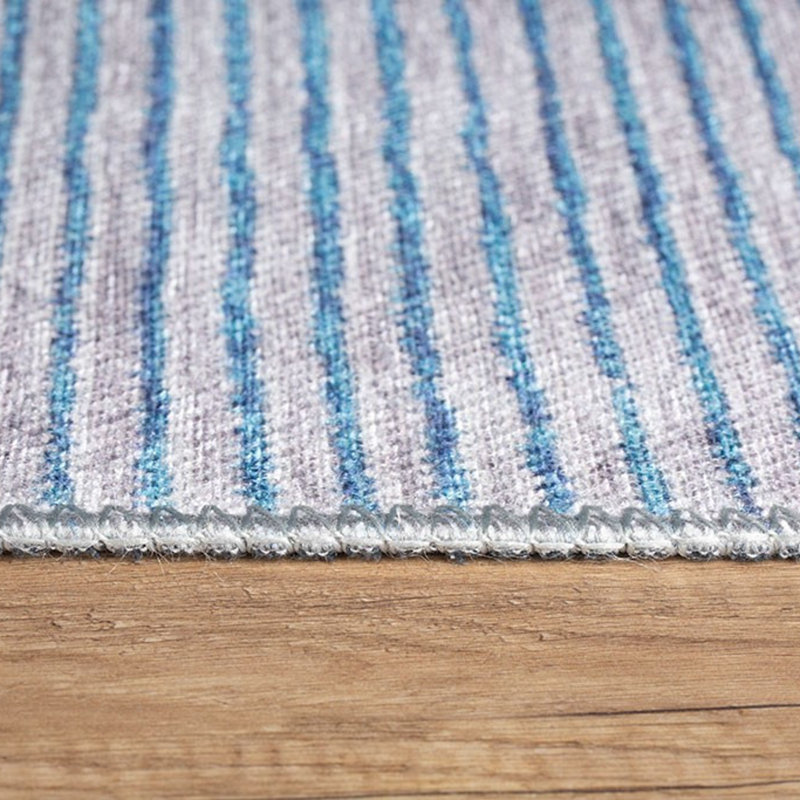 Tapis gris / bleu clair en polyester tissé à la machine Deboser, Rectangle 4 pi 7 po x 6 pi 3 po