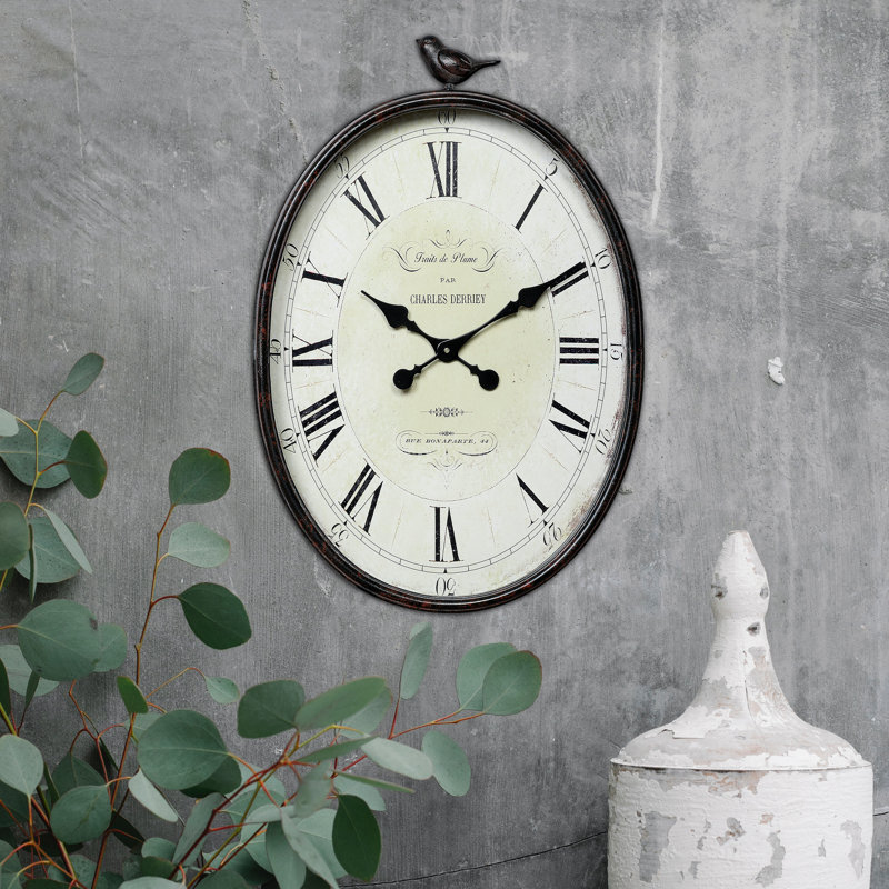 Scriber Oval Metal Wall Clock with Bird