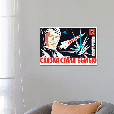 Vintage Soviet Space Poster Of Cosmonaut Yuri Gagarin Holding A Star by Stocktrek Images - Wrapped Canvas Print