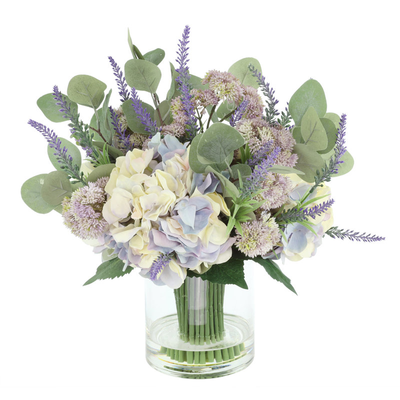Arrangement floral mixte avec hortensias, lavande et sédum