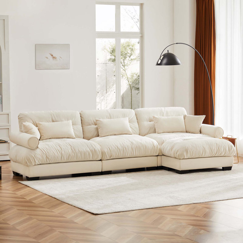 Canapé modulaire en L à assise profonde avec 1 repose-pieds mobile, Velours crème