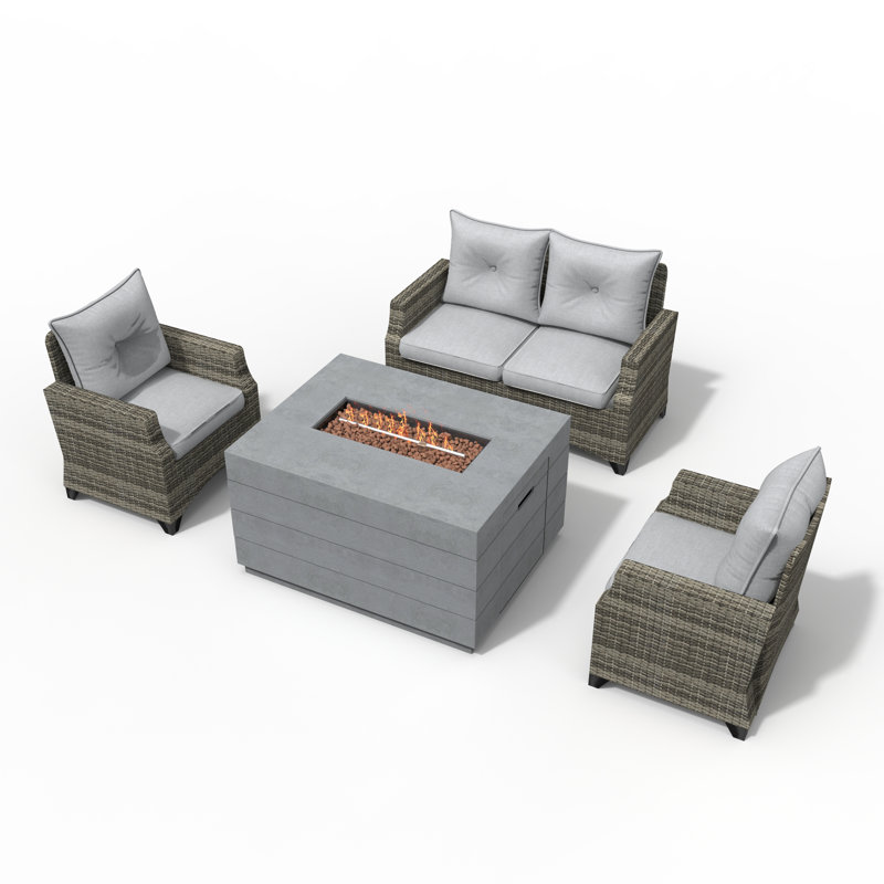 Schwerin Wicker 4 - Person Patio Conversation Set with Cushions