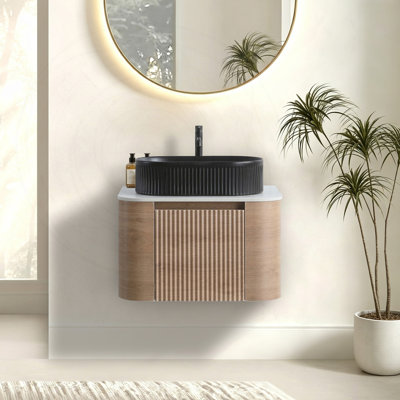 Meuble-lavabo 24 po avec lavabo ovale en céramique noire et porte-serviettes