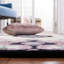 Tapis floral en laine touffeté à la main Dalayssa-590905205