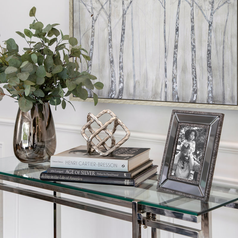 Decorative Object Metal Metal Interlocking Geometric Cube Design with Textured Hammered Surface for Contemporary Accent Display.