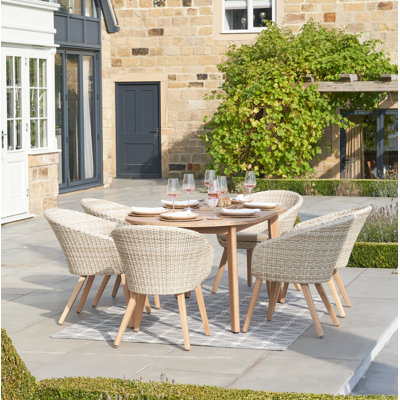 Cambrai 6 - Person Acacia Premium All-Weather Wicker Patio Dining Set with Oval Table