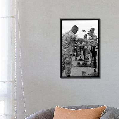 " Soldier Pays His Respect To Fallen Marines " by Stocktrek Images