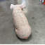 Statue de cochon assis