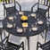 Argyri 6 - Person Metal Patio Dining Set with Round Table
