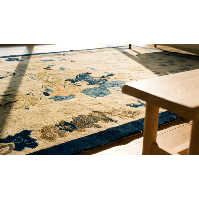 Petit tapis rectangulaire en laine noué à la main de couleur ivoire antique