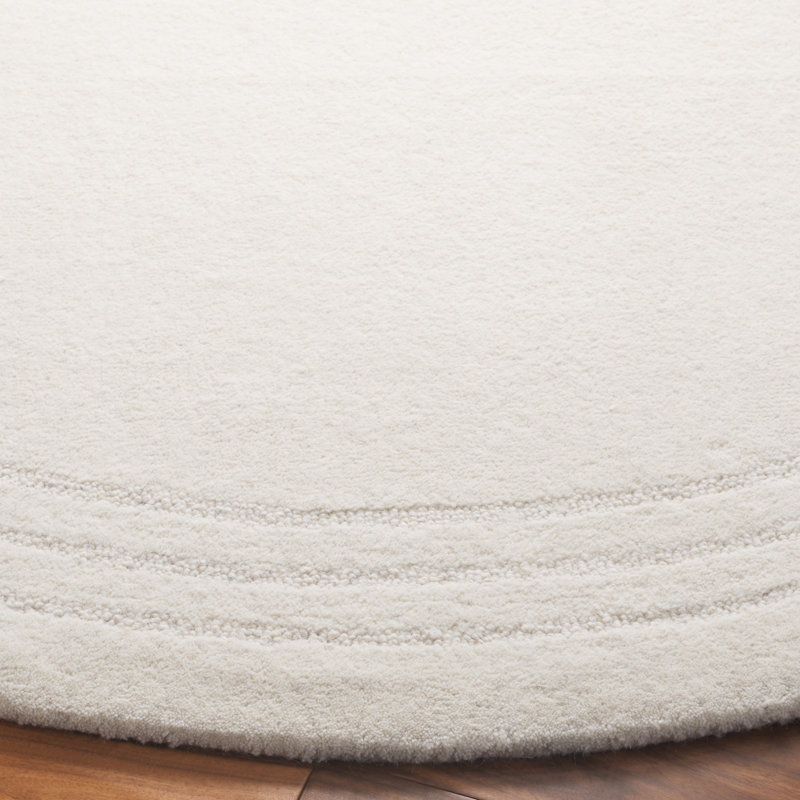 Sreemaan Hand Tufted Wool Cotton Solid Color Rug in Ivory, Round 6'