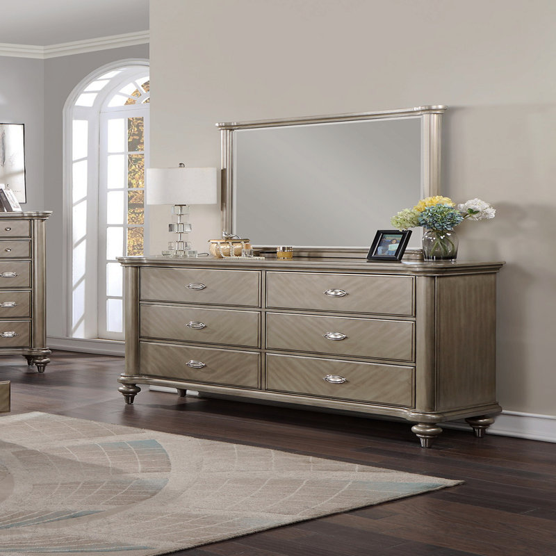 Commode de luxe avec finition argentée et champagne