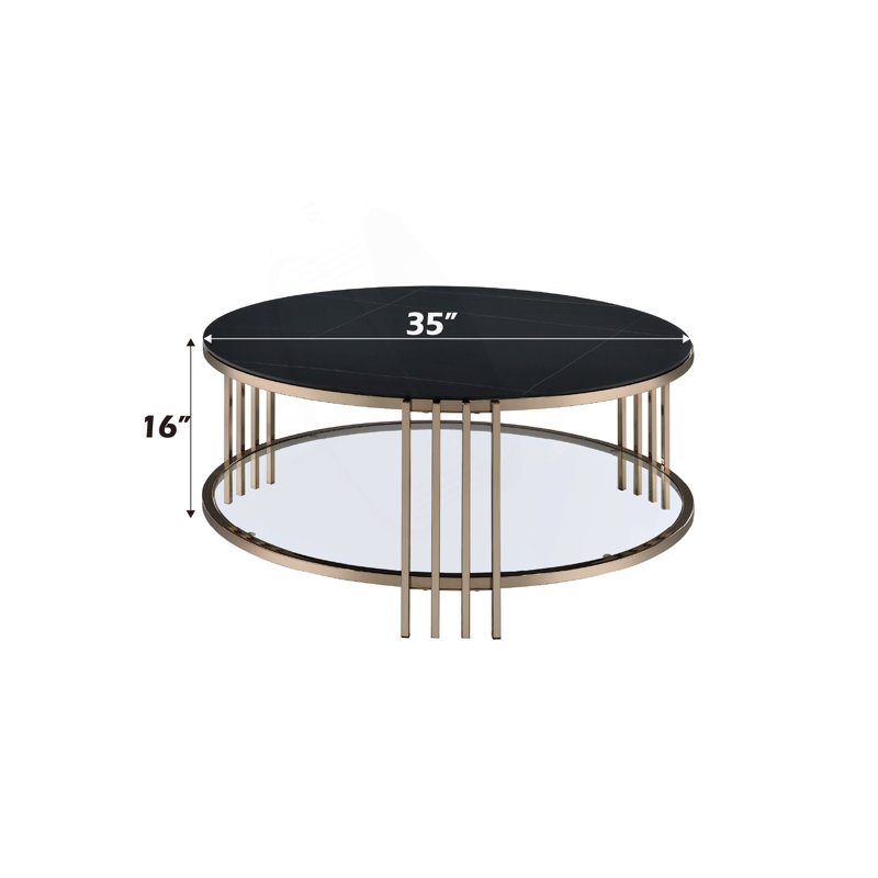 Table basse ronde avec plateau en pierre frittée et structure en métal champagne