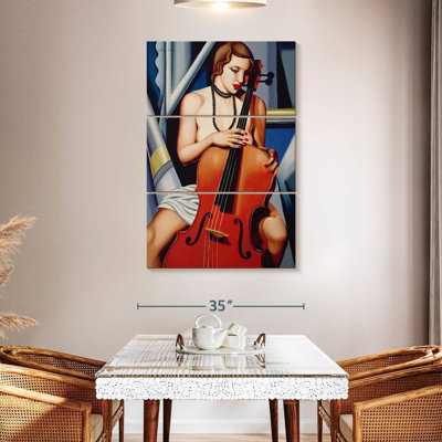 Femme Abarca avec violoncelle