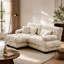 Luxueux canapé en chenille pour le salon avec plusieurs coussins et repose-pieds convertible, pour plus de confort et de style.-653375879