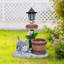 Jardinière en forme de chat allongé avec lumière DEL intégrée et surface de plantation fonctionnelle pour l'ambiance extérieure et la verdure.